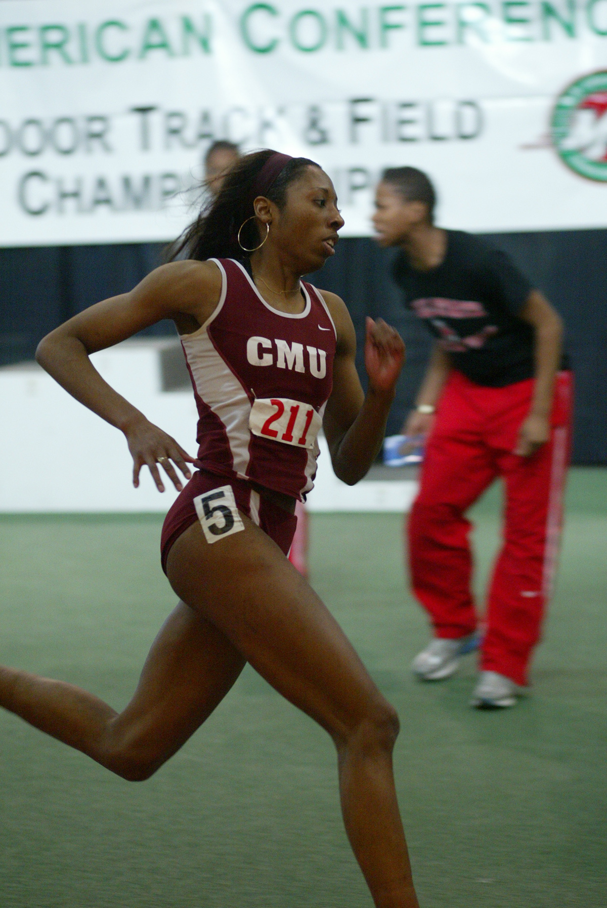 CMU Women's track athlete running